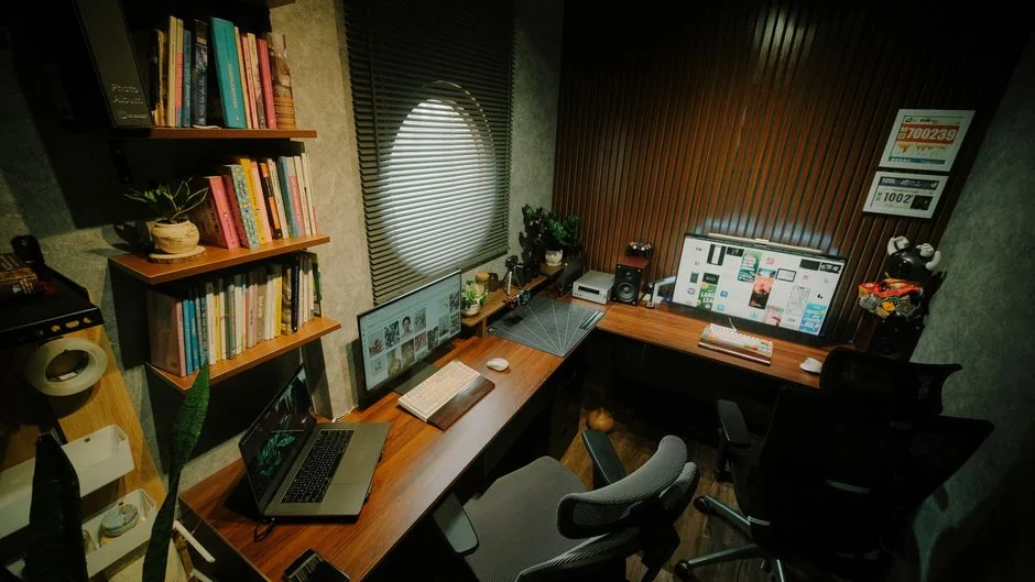 A modern workspace featuring a laptop, tablet, and smartphones, well suited for tech and freelance use.